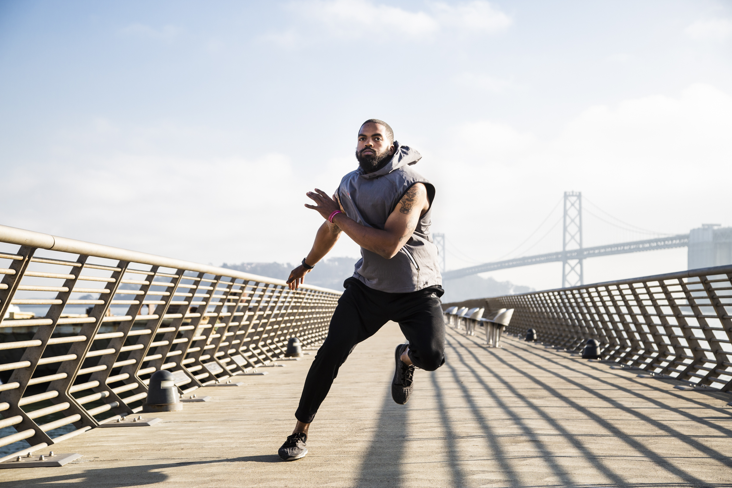 Lifestyle brand shoot with talent in front of coastal landscape near San Francisco