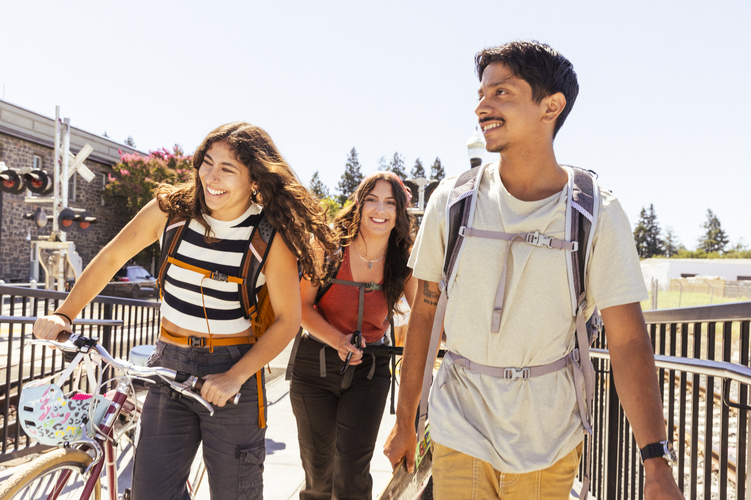 Commercial Photographer work for Osprey Packs active lifestyle commuter pack series - 3 gen z friends at a metro station.
